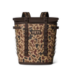 Camouflage-patterned cooler backpack with brown straps and YETI logo 