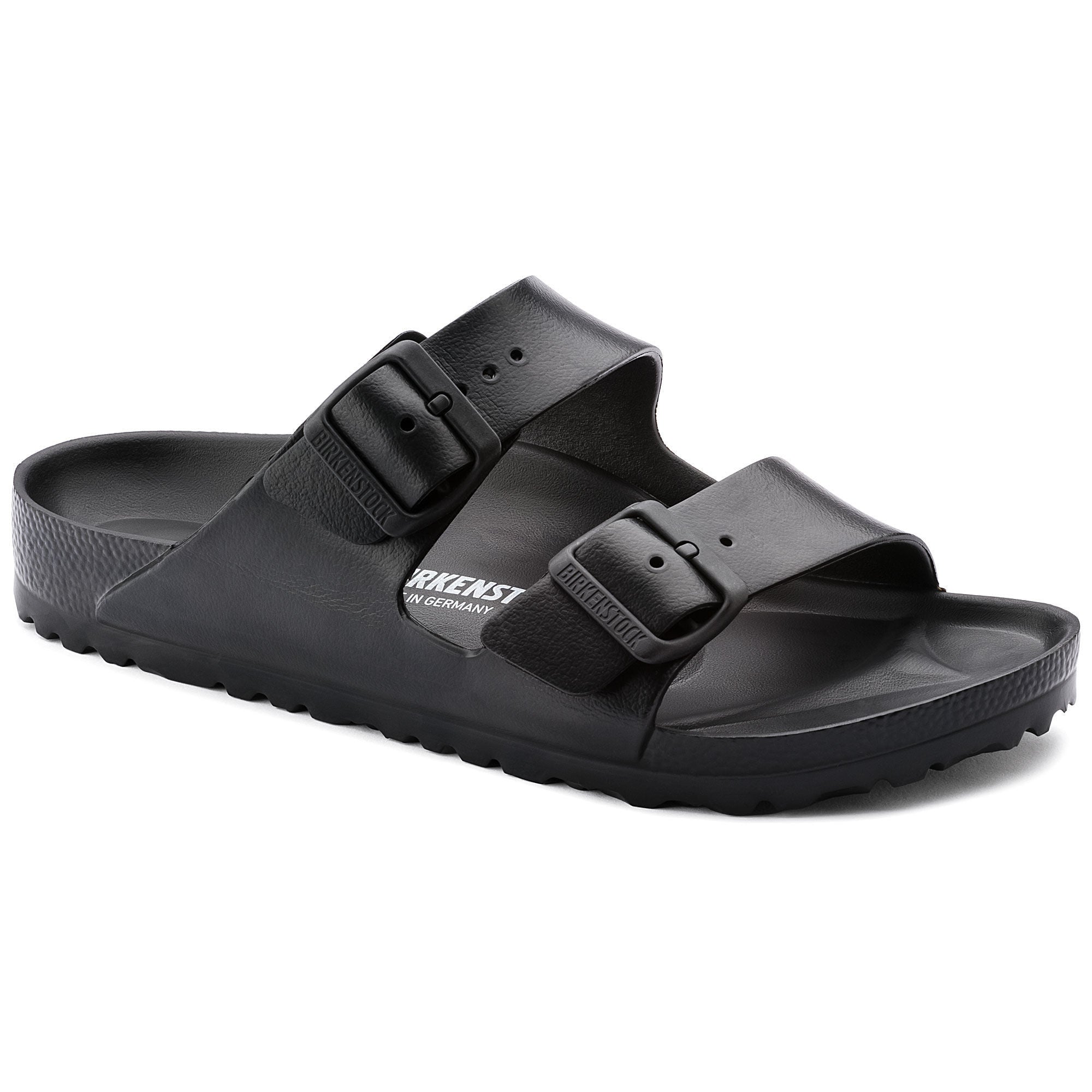 A pair of Birkenstock Arizona EVA sandals in black color with a contoured footbed and two adjustable straps.